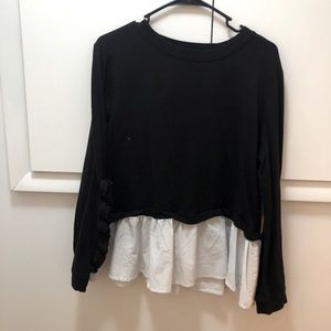 Sweatshirt on top, business shirt on bottom